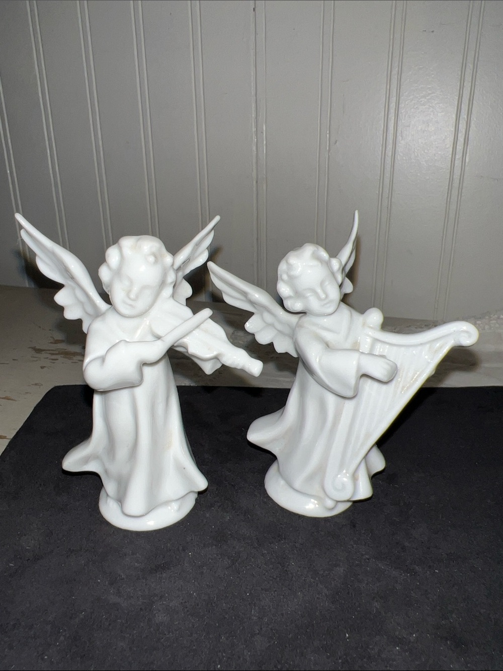 Pair of angels in biscuit porcelain, ca. 1920